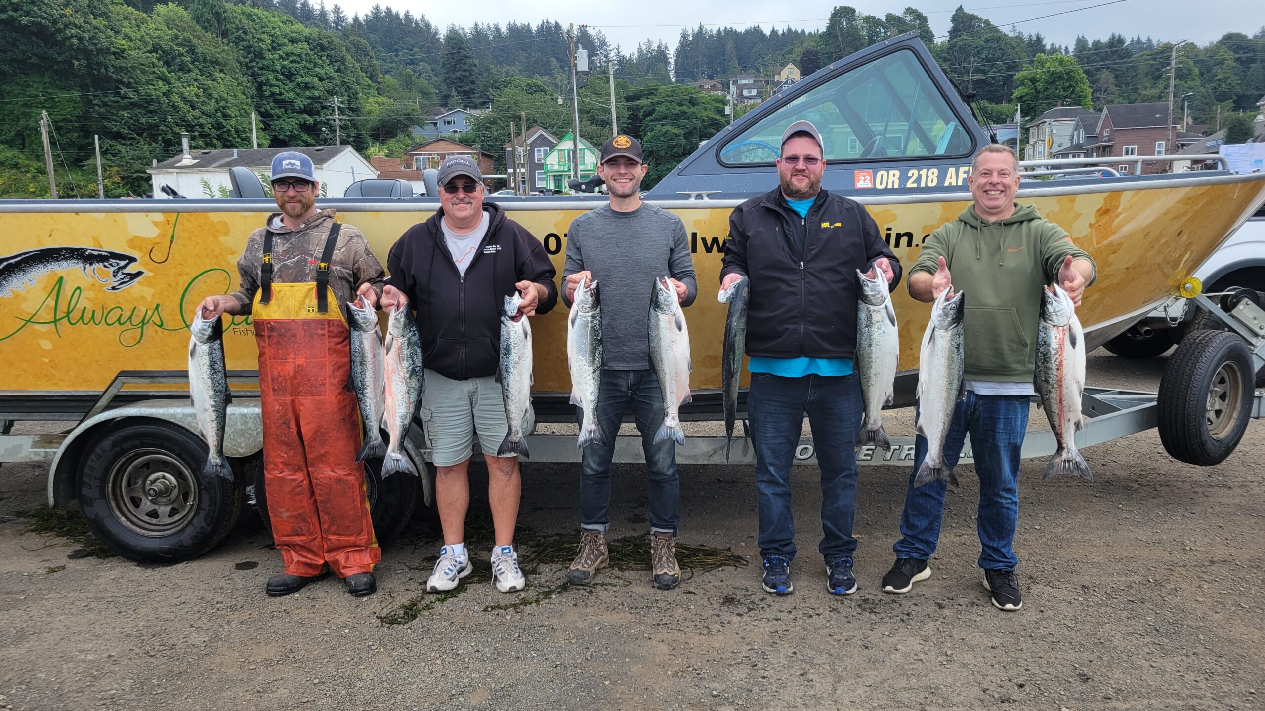 5 guys holding 10 salmon in Astoria